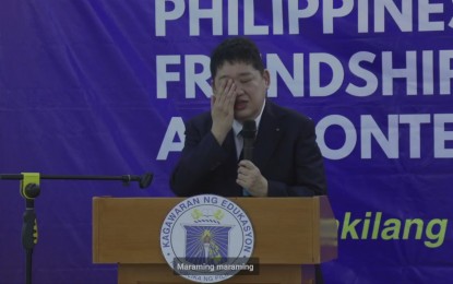 <p><strong>TEARS OF JOY</strong>. Japanese philanthropist Kenjie Mori wipes his tears as he expressed his delight during his speech at the 3rd Philippine-Japan Friendship Art Contest on Tuesday (June 28, 2022). He said he appreciates the respect highlighted in the friendship between the Philippines and Japan. <em>(Screengrab)</em></p>