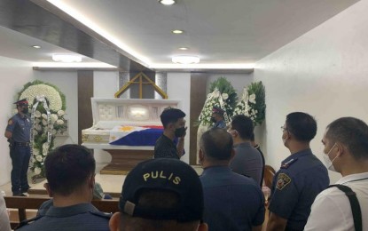 <p><strong>HERO COP.</strong> Police officials visit the wake of Staff Sgt. Nikki Codera in this undated photo. Codera was killed in an encounter against CPP-NPA member identified as Hubert Aplacador that ensued during an operation in Pasay City last June 24. <em>(Photo courtesy of PNP)</em></p>
