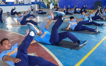 <p><strong>SHAPE UP.</strong> Police officers perform physical exercises inside the headquarters of Police Regional Office-10, the Camp 1Lt. Vicente Alagar, in Cagayan de Oro City in this undated photo. Brig. Gen. Benjamin C. Acorda Jr. the PRO-10 director, challenged the personnel Wednesday (June 29, 2022) to shape up after about 40 percent of 9,407 members are reportedly overweight or obese. <em>(Photo courtesy of PRO-10)</em></p>