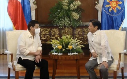 <p>Outgoing President Rodrigo R. Duterte (left) and incoming President Ferdinand "Bongbong" Marcos Jr.<em> (Screengrab from RTVM)</em></p>