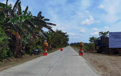 <p><strong>BETTER LINKAGES.</strong> The opening of the PHP209-million Poblacion-Limbaan-Suawon-Macgum farm-to-market road with bridges subproject of the Department of Agriculture-Philippine Rural Development Project in New Corella town, Davao del Norte on Wednesday (June 29, 2022) is expected to improve transport and market access. The 15.3-kilometer project was constructed across the Limbaan Creek, north of the New Corella Poblacion channel.<em> (Photo from DA-PRDP)</em></p>