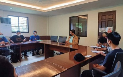 <p><strong>HOUSING</strong>. San Remigio Mayor Margarito Mission Jr. (In brown jacket) presides over a meeting for lot identification as the counterpart of the local government unit for the housing program for agrarian reform beneficiaries in his hometown, on June 10, 2022. Mission on Friday (July 1, 2022) congratulated President Ferdinand Marcos Jr. on his plan to provide various support to the agricultural sector to boost production. <em>(Photo courtesy of San Remigio LGU)</em></p>