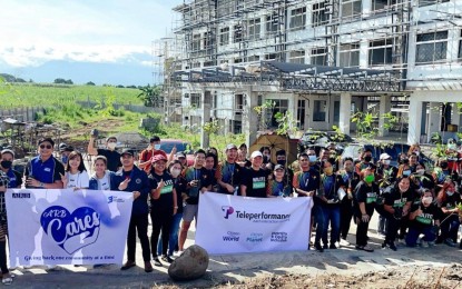 <p><strong>ENVIRONMENTAL CAMPAIGN</strong>. Participants from at least six call center firms in Bacolod City and Negros Occidental join the tree-growing activity at the site of the Negros Occidental Language and Information Technology Center Global Campus in Talisay City on Thursday (June 30, 2022). The provincial government-owned educational facility is expected to be fully operational in 2023. (<em>Photo courtesy of Negros Occidental Language and Information Technology Center)</em></p>