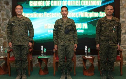 <p><strong>NEW 'DATA MANAGER'.</strong> Lt. Col. Angelo Guzman (left) assumes office as the new chief of the Philippine Army's (PA) Operations Research Center (ORC) in a turnover ceremony in Fort Bonifacio on Thursday (June 30, 2022). Guzman replaced Col. Harold Cabunoc (right) of the Army's Officer Candidate School, Training and Doctrine Command. <em>(Photo courtesy of Philippine Army)</em></p>