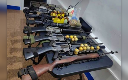 <p><strong>UNLICENSED FIREARMS.</strong> The high-powered firearms seized by police from a former village chief who ran and lost in the vice mayoralty race of Barira town, Maguindanao. The suspect, Usop Sanggacala Aron, did not resist arrest when served with a search warrant at Parang town of the same province on Friday (July 1, 2022). <em>(Photo courtesy of Ferdinandh Cabrera - Cotabato News Group)</em></p>