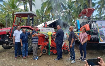 <p><strong>FARMING MACHINES.</strong> National Corn Program Director Milo Delos Reyes (3rd from left) leads the turnover of PHP3.8 million worth of farming equipment to the corn farmers in Tago, Surigao del Sur, Thursday (June 30, 2022). The equipment was received by Richard Virtudazo (2nd from right), the chair of local organization BAKIFA, and witnessed by Melody Quimary (right), the DA-13 Regional Corn Program Coordinator.<em> (Photo courtesy of DA-13)</em></p>