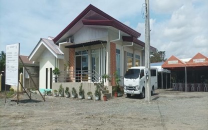 <p><strong>ENTERPRISE SUBPROJECT</strong>. The minivan and one-unit chocolate processing building in Panabo City, Davao del Norte, a project of the Department of Agriculture-Philippine Rural Development Project (DA-PRDP), was turned over to Rehoboth Agriculture Cooperative on June 29, 2022. The project aims to boost the cacao industry in Davao del Norte.<em> (Photo from DA-PRDP)</em></p>