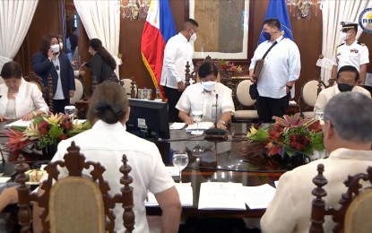 <p><strong>1ST CABINET MEETING</strong>. President Ferdinand “Bongbong” Marcos presides over the first Cabinet meeting at Malacañan Palace on Tuesday (July 5, 2022). Marcos discussed with his Cabinet the present economic situation. <em>(Screengrab from RTVM)</em></p>