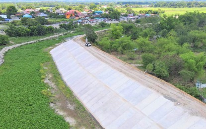 <p><strong>SLOPE PROTECTION</strong>. An aerial photo shows the newly-completed slope protection structure implemented by the Department of Public Works and Highways (DPWH)along the Porac River in Floridablanca, Pampanga. The DPWH has been implementing projects to mitigate flooding along Floridablanca’s major river systems by building flood control structures. <em>(Photo by DPWH Region 3)</em></p>