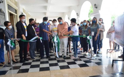<p><strong>ADDRESSING MALNUTRITION</strong>. Iloilo Governor Arthur Defensor Jr. cuts the ribbon to open the Nutri-Agri Fair at the Casa Real as part of the activities for the 48th Nutrition Month on Monday (July 6, 2022). The provincial government launched its Project Nutrivac: Nutrition and Vaccination Towards A New Normal in the Province of Iloilo on July 5 to boost its inoculation campaign and address issues of malnutrition. <em>(Photo courtesy of Balita Halin sa Kapitolyo FB Page)</em></p>