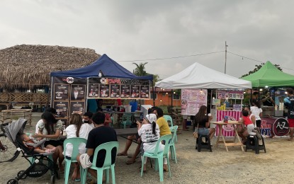 <p><strong>RECOVERING</strong>. Local businesses such as in this undated photo in Laoag City continue to generate employment from the locals amid the pandemic. A preliminary report from the Philippine Statistic Authority said the employment rate improved by 1.6 percent from 92.5 percent in the first quarter of 2021 to 94.1 percent during the same period this year. <em>(File photo by Leilanie Adriano)</em></p>