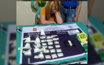 <p><strong>DRUG BUST</strong>. High-value drug personality Christine Dacumos, 36, was arrested during a police buy-bust in Barangay Singcang-Airport, Bacolod City on Tuesday night (July 5, 2022). The suspect yielded 415 grams of suspected shabu valued at PHP2.8 million, according to a report of the Philippine National Police Drug Enforcement Group Special Operations Group-Western Visayas.<em> (Photo courtesy of Police Regional Office-Western Visayas)</em></p>