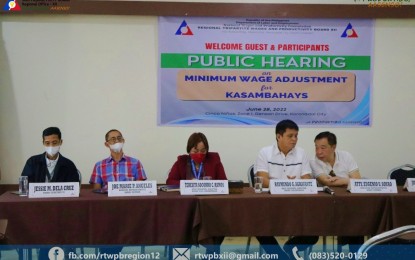 <p><strong>KASAMBAHAY WAGE HIKE.</strong> The Regional Tripartite Wages and Productivity Board in the Soccsksargen Region (RTWPB-12) conducts a public hearing on the minimum wage adjustments for domestic helpers in the region on June 28, 2022 in Koronadal City. RTWB-12 Board Secretary Jessie Dela Cruz (leftmost) says Wednesday (July 6, 2022) the board unanimously approved the adjustment after the public hearing, with the new wage rate becoming effective on July 16, 2022. <em>(Photo courtesy of RTWBP-12)</em></p>