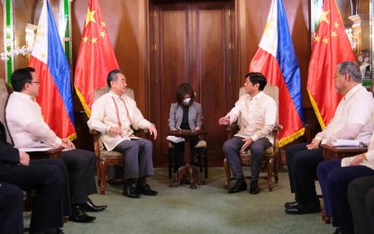 <p><strong>BILATERAL TIES</strong>. President Ferdinand “Bongbong” Marcos Jr. receives Chinese State Councilor and Foreign Minister Wang Yi in Malacañang Palace on Wednesday (July 6, 2022). Marcos and the top Chinese diplomat discussed a wide range of issues, including infrastructure, energy, agriculture and bilateral ties. <em>(Office of the President)</em></p>