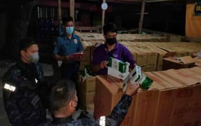<p><strong>SMUGGLED CIGARETTES</strong>. Policemen and soldiers in coordination with the Bureau of Customs (BOC) seize a total of P15.2 worth of smuggled cigarettes in two anti-smuggling operations in Zamboanga City. The bulk of the confiscation was made early Thursday (July 7, 2022) of Barangay Ayala, Zamboanga City. <em>(Photo courtesy of the 2nd Zamboanga City Mobile Force Company)</em></p>