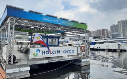<p><strong>CIRCULAR EXPLORER.</strong> Holcim Group launches the Circular Explorer at the Manila Yacht Club on Thursday (July 7, 2022). The multinational company has chosen the Philippines to pioneer the solar-powered catamaran designed to collect plastic waste in bodies of water that will also help in Manila Bay rehabilitation. <em>(PNA photo by Kris Crismundo)</em></p>