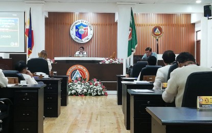 <p><strong>PRIORITIES</strong>. Members of Antique’s legislative body listen to the presentation of the executive agenda, plans, and platform (EAPP) by provincial government administrator Nery Duremdes on behalf of Governor Rhodora J. Cadiao during the Provincial Board Inaugural Session at the Legislative Building in San Jose de Buenavista on Thursday (July 7, 2022). The realization of the provincial government center and upgrading of three major hospitals are among the priorities of the new administration. <em>(PNA photo by Annabel Consuelo J. Petinglay) </em></p>