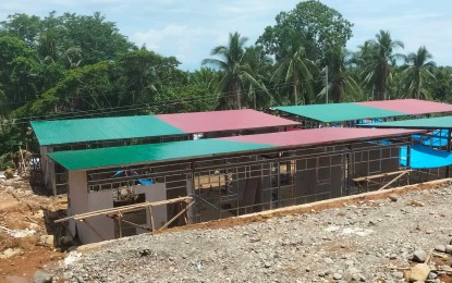 <p><strong>ALMOST DONE.</strong> The temporary shelters under construction in Maganhan village, Baybay City. The shelter meant for landslide survivors will be turned over to recipient families on July 15, 2022. <em>(Photo courtesy of Office of Civil Defense)</em>  </p>