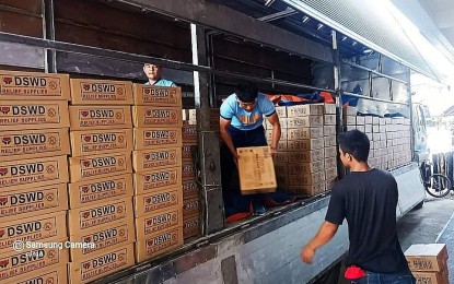 <p><strong>FOOD PACKS</strong>. Family food packs are unloaded at a warehouse of the Department of Social Welfare and Development-Cordillera on Saturday (July 9, 2022) for victims of a flash flood in Banaue, Ifugao. The DSWD-CAR said family food packs have also been prepositioned in other provinces in the region affected by inclement weather in the area. <em>(PNA photo from DSWD-CAR FB)</em></p>
<p><em> </em></p>