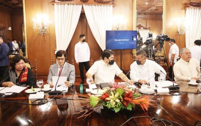 <p><strong>POSITIVE.</strong> Justice Secretary Jesus Crispin Remulla (4th from left) attends the first Cabinet meeting of the Marcos administration in Malacañang on Tuesday (July 5, 2022). He tested positive for Covid-19 on July 7 and Marcos on July 8. <em>(Photo courtesy of BBM Facebook)</em></p>