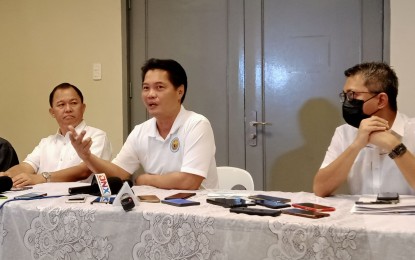 <p><strong>PRESS BRIEFING</strong>. Bacolod City Mayor Alfredo Abelardo Benitez (center) with spokesperson Lyzander Dilag (left) and City Administrator Pacifico Maghari III during a press conference at the Government Center on Monday (July 11, 2022). Benitez said he asked the City Legal Office to review the local government’s vaccine purchase agreement with AstraZeneca Pharmaceuticals Philippines Inc. after the manufacturer asked for payment for the remaining 434,000 doses that the city has not officially received. <em>(PNA photo by Nanette L. Guadalquiver) </em></p>