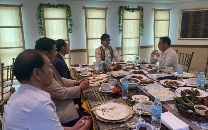 <p><strong>BARMM COLLABORATION.</strong> Department of the Interior and Local Government Secretary Benhur Abalos (2nd from right) and Naguib Sinarimbo (right), the Bangsamoro Autonomous Region in Muslim Mindanao (BARMM) interior minister, exchange ideas on the operation of BARMM and MILG during a meeting in Manila on Monday (July 11, 2022). Abalos has committed to continue supporting the BARMM programs in its local government units. <em>(Photo courtesy of MILG Minister Sinarimbo)</em></p>