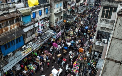<p>Picture shows people on the busy streets of New Delhi's Shahjahanabad, the walled old city part of India's capital</p>