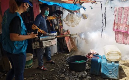 <p><strong>FIGHTING DENGUE</strong>. Health workers conduct fogging activities in Tacloban City in this June 18, 2022 photo. Dengue fever cases continue to rise in Eastern Visayas with nine deaths and 2,678 patients downed by mosquito bites from January 1 to July 9 this year, the Department of Health (DOH) reported on Tuesday (July 12). <em>(Photo courtesy of Tacloban city health office)</em></p>