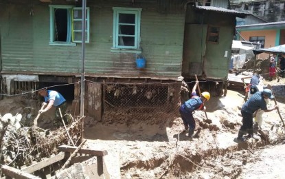 <p><strong>REHAB PLAN</strong>. Local authorities conduct a disaster response at a mud-covered community in Ifugao, Banaue after a flash flood on July 7, 2022. The Department of Agriculture in the Cordillera has proposed a Banaue rehabilitation plan using PHP4.4 million to buy vegetable seeds, livestock, and poultry, including other agricultural supplies for residents and farmers affected by the flash flood. <em>(PNA file photo)</em></p>