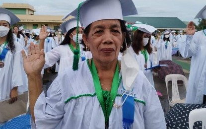<p><strong>NEVER TOO LATE</strong>. Josie Isanan Balasta, a 66-year-old grandmother, during her senior high school graduation in Catarman, Northern Samar on July 9, 2022. She has been gathering all documentary requirements to enroll in a private tertiary school in Catarman town to take up education. <em>(Photo courtesy of Rustia Balasta)</em></p>