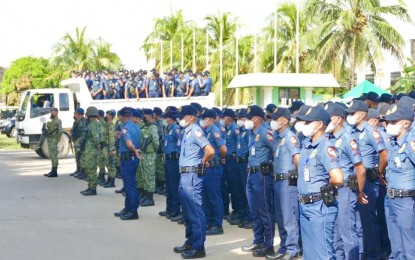 <p><strong>PEACE MISSION</strong>. Some of the 232 policemen during their send-off ceremony in Catarman, Northern Samar on July 11, 2022. The government is strengthening its fight against the New People’s Army in five conflict-stricken villages of Palapag, Northern Samar with the deployment of policemen part of the Retooled Community Support Program team. <em>(Photo courtesy of Northern Samar police provincial office)</em></p>