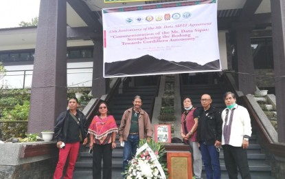 <p><strong>PEACE TALKS</strong>. Gabino Ganggangan (3rd from left), Leonardo Bun-as (5th) and Andres Ngao-i (rightmost) - who took part in the peace agreement between the government and the Cordillera People's Liberation Army more than three decades ago - commemorate the founding anniversary of the Cordillera Administrative Region, at Mount Data Hotel in Mountain Province in this file photo on Sept. 13, 2021. The region's quest for autonomy continues as its people preserve peace and order in the region. <em>(PNA file photo by Liza T. Agoot)</em></p>