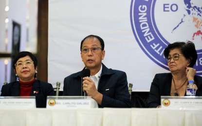 <p><strong>PEACE OFFICIALS.</strong> Secretary Carlito Galvez Jr. (center), Presidential Adviser on Peace, Reconciliation, and Unity, talks about the progress of localized peace talks during a press conference at Camp Aguinaldo in Quezon City on Friday (July 15, 2022). He is flanked by Assistant Solicitor General Angelita Miranda (left) and National Security Adviser Clarita Carlos after they attended the NTF-ELCAC executive committee meeting. <em>(PNA photo by Joey O. Razon)</em></p>