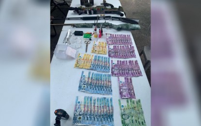 <p><strong>EVIDENCE</strong>. The confiscated pieces of evidence that include firearms and illegal drugs during a police operation in Barangay Mahipon, Gapan City, Nueva Ecija on Saturday (July 16, 2022). Arrested was an alleged leader of a robbery and illegal drugs group and his three companions. <em>(Contributed photo)</em></p>