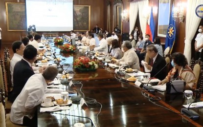 <p><strong>THIRD MEETING.</strong> President Ferdinand "Bongbong" Marcos Jr. on Tuesday (July 19, 2022) presides over his third Cabinet meeting at Malacañan Palace's Aguinaldo State Dining Room. Marcos and his Cabinet are expected to discuss basic education, social welfare, and other matters of national interest. <em>(Screengrab from RTVM's official Facebook page)</em></p>