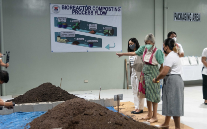 Trash can be cash in Manila recycling facility