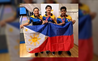 <p><strong>BRONZE WINNERS.</strong> Stephen Luke Diwa (right) with doubles partner Marc Dylan Custodio and coach Biboy Rivera during the IBF U-21 World Championships in Sweden last month. The Philippines will send 16 athletes to the 21st Asian Junior Tenpin Bowling Championships scheduled from August 14 to 20 at the Blu-O Rhythm and Bowl Ratchayothin in Bangkok, Thailand. <em>(Contributed photo)</em></p>