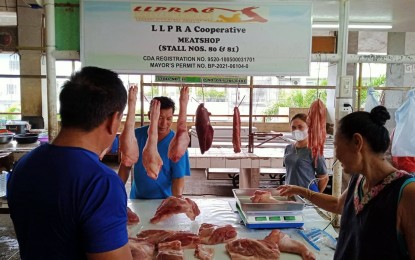 <p><strong>MEAT SHOP</strong>. The Legazpi Livestock Poultry Raisers Agriculture Cooperative (LLPRAC) sells meat products at reasonable prices while using accurate weighing scales. The cooperative buys live pigs from its hog raiser members. <em>(Photo by Emmanuel Solis)</em></p>