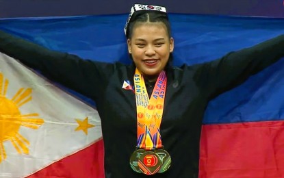 <p><strong>FUTURE OLYMPIAN</strong>. Vanessa Sarno of Bohol wins the Junior women's 71kg. category title during the Asian Youth and Junior Weightlifting Championships in Tashkent, Uzbekistan on Friday (July 22, 2022). She tallied 230kg., lifting 100kg. in snatch and 130kg. in clean and jerk, to claim the title. <em>(Photo courtesy of the Asian Weightlifting Federation) </em></p>