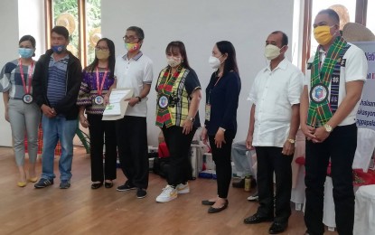 <p><strong>PHILHEALTH FOR PWDs.</strong> Persons with disabilities (PWDs) in the province of Antique receive their Member Data Record (MDR) during the culminating activity of the 44th National Disability, Prevention and Rehabilitation Week (NDPRW) on Friday (July 22, 2022). Ruben Balbuena, president of the Antique Association of PWDs, said in an interview Sunday that the PhilHealth coverage is a big privilege for them. <em>(PNA photo by Annabel Consuelo J. Petinglay)</em></p>