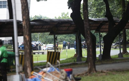 <p><strong>SCENE OF THE CRIME.</strong> Cops investigate the crime scene at Ateneo De Manila University in Quezon City on Sunday (July 24, 2022). The gunman, a medical doctor, reportedly had a personal issue with one of the three fatalities, former Lamitan City, Basilan mayor Rose Furigay. <em>(PNA photo by Robert Alfiler)</em></p>
<p><em> </em></p>