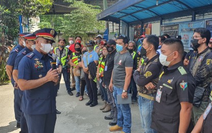 <p><strong>FORCE MULTIPLIERS</strong>. Col. Aaron Mandia (left), Cagayan de Oro City police chief, briefs members of local civic groups before activating them as force multipliers. There are about 25 groups in the city that have been tapped to help police stations in monitoring peace and order. <em>(PNA photo by Nef Luczon)</em></p>