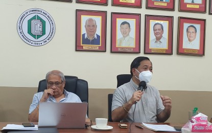 <p><strong>ORO CHAMBER.</strong> Cagayan de Oro Chamber of Commerce and Industry Foundation (Oro Chamber) president Ray Talimio Jr. (right) and former president Ruben Vegafria discuss salient points in this undated photo during one of the forums they facilitated in Cagayan de Oro City. On Friday (April 21, 2023), the Oro Chamber says it has partnered with the Department of Trade and Industry and the Department of Science and Technology to roll out innovations to further add value to several crops. <em>(PNA file photo by Nef Luczon)</em></p>