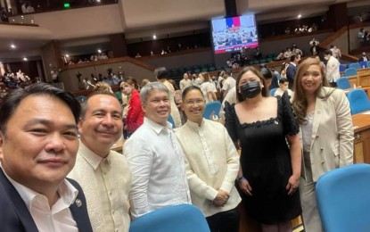 <p><strong>NEGRENSE LAWMAKERS</strong>. Bacolod City Lone District Rep. Greg Gasataya (left), with other lawmakers from Negros Occidental during the opening of the 19th Congress at the Batasang Pambansa in Quezon City on Monday (July 25, 2022). Gasataya said during the State of the Nation Address, he was informed of President Ferdinand Marcos Jr.’s priorities in public services aligned with his legislative agenda for the city. <em>(Photo from Congressman Greg Gasataya Facebook page) </em></p>