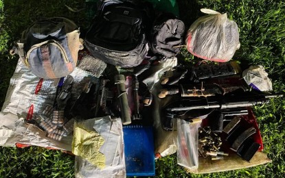 <p><strong>GUNS AND AMMO</strong>. The firearms, ammunition, and other items recovered by government troops following an encounter with New People's Army rebels in the hinterlands of Barangay Budlasan, Canlaon City in Negros Oriental on Tuesday (July 27, 2022). Three NPA rebels were killed in the clash, including two females. <em>(Photo courtesy of 62IB, Philippine Army)</em></p>