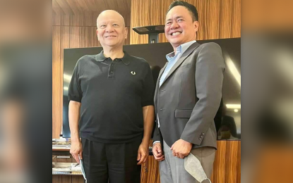 <p><strong>INDUSTRIALIZATION.</strong> Dinagat Islands Governor Nilo Demerey Jr. (right) and SMC president and CEO Ramon S. Ang. Demerey confirmed SMC’s decision to establish a USD500 million electric car battery plant in Dinagat Islands after his meeting with Ang on Wednesday (July 27, 2022). <em>(Photo courtesy of Gov. Nilo Demerey Jr.)</em></p>