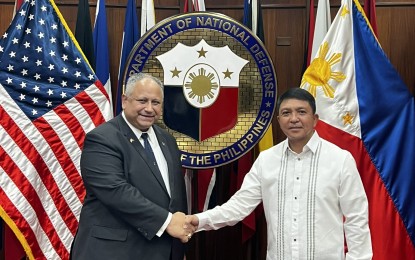<p><strong>COMMITMENT.</strong> Incoming Defense Undersecretary Franco Nemesio Gacal (right) receives US Secretary of the Navy Carlos del Toro during the latter’s visit to the DND main office in Camp Aguinaldo, Quezon City on July 26, 2022. Del Toro underscored Washington DC's commitment to a positive and productive relationship with Manila.<em> (Photo courtesy of the Office of the US Secretary of the Navy)</em></p>