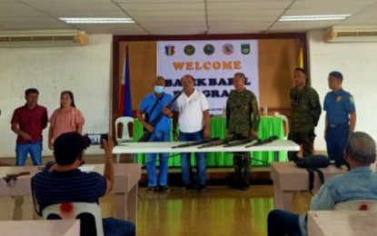 <p><strong>FIREARMS SURRENDER.</strong> Local officials in Carmen, North Cotabato turn in seven high-powered guns to military authorities as part of their contribution to the fight against loose firearms, at the Army’s 602nd Infantry Brigade headquarters in the town on Wednesday (July 27, 2022). The surrender of firearms is part of the government’s 'Balik Baril' program. <em>(Photo courtesy of 6ID)</em></p>
