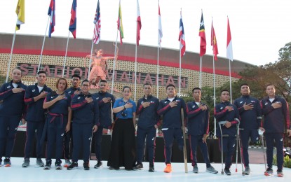 <p><strong>ALL SET.</strong> Select members of the national paralympic team, led by chef de mission Walter Torres (5th from left) attend the flag-raising ceremony of the 11th ASEAN Para Games at Manahan Stadium in Surakarta, Indonesia on Wednesday (July 27, 2022). The Philippines will compete in 10 events in the weeklong meet.<em> (Photo courtesy of Team PH Media Bureau)</em></p>
