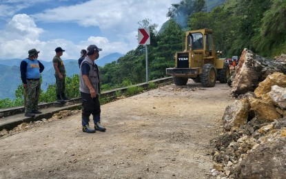 <p>Road-clearing operations in Kibungan, Benguet <em>(Photo courtesy of Cesar Molitas Facebook)</em></p>
